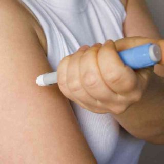 person injecting weight loss injection