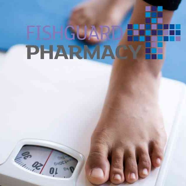person in bare feet stepping on scales
