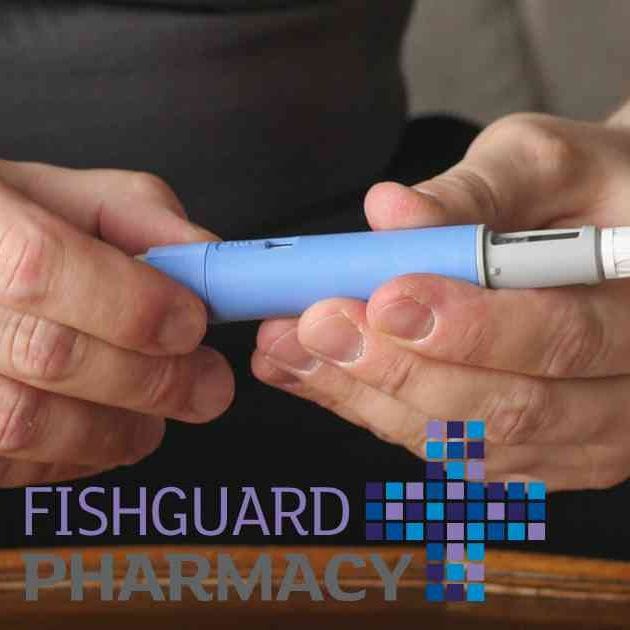 person holding weight loss injection