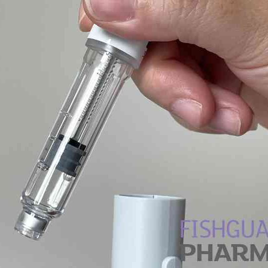 person removing weight loss injection from cap
